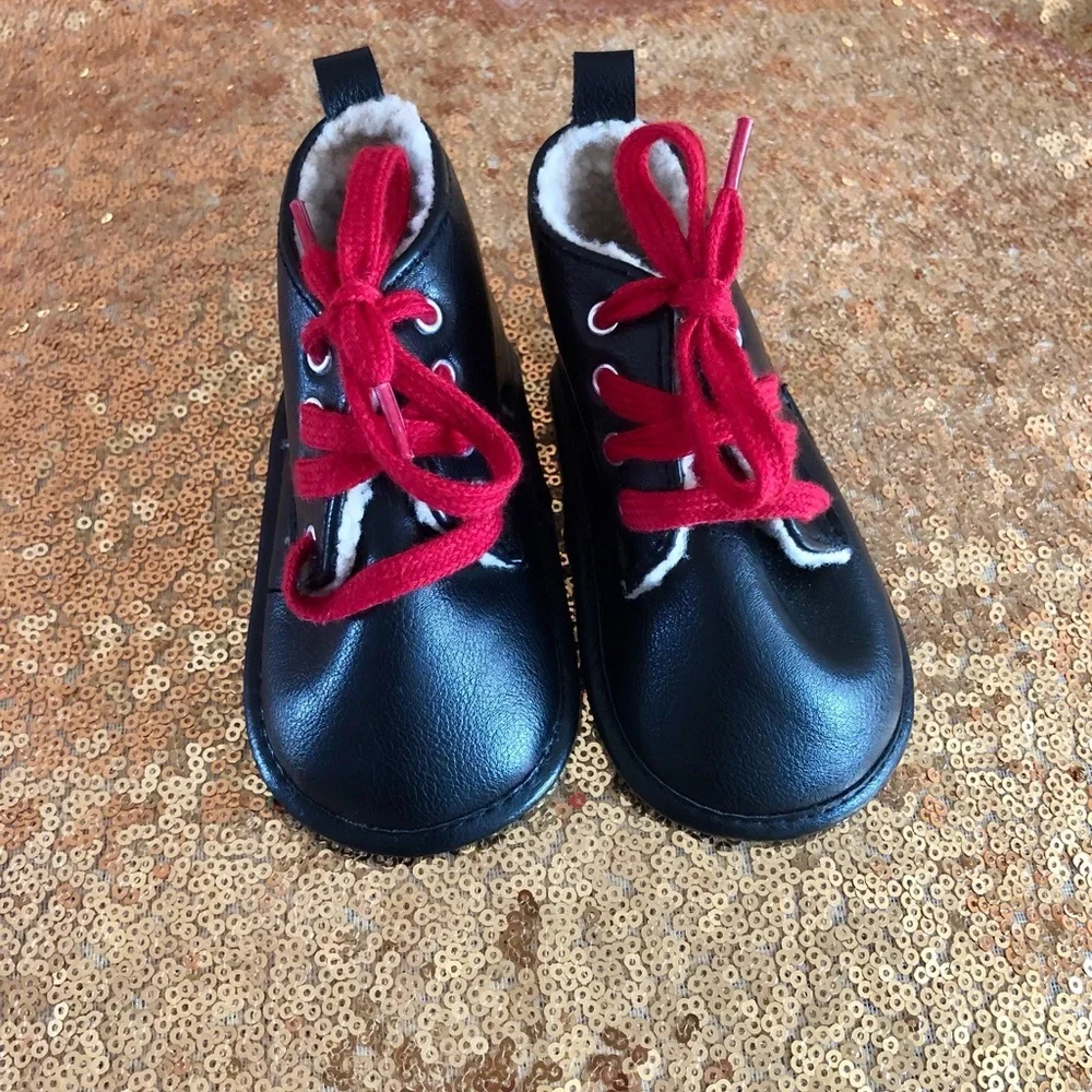 Fila-Black w/sherpa infant boots w/red laces 9-12 months old. Booties shoes
